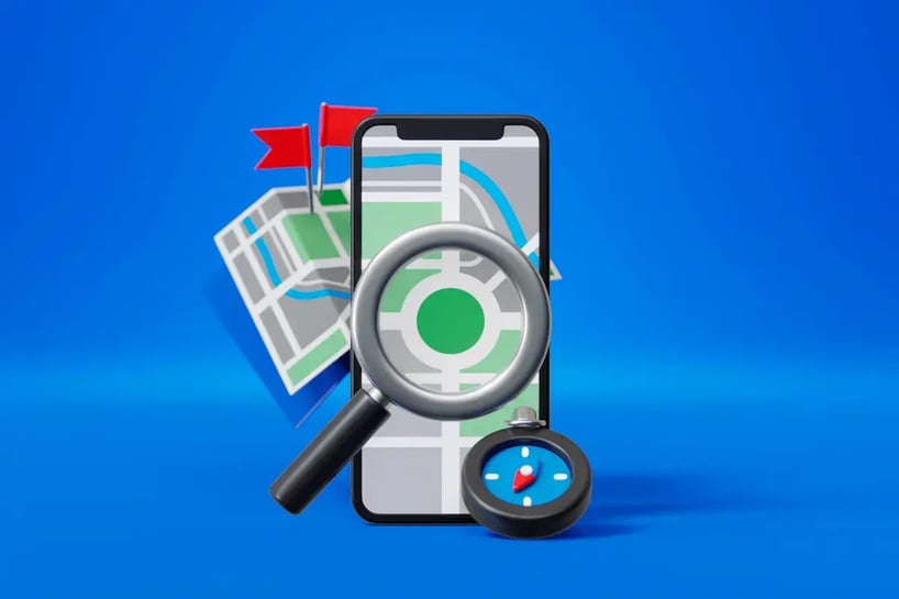 Ilustração de celular com mapa, lupa e bússola representando estratégias de SEO local e busca por empresas próximas.